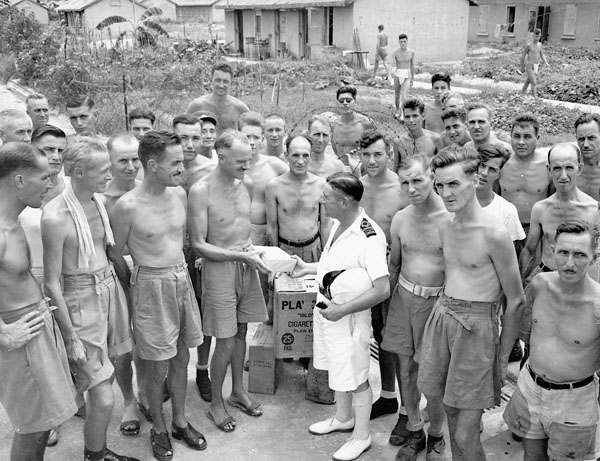 
 PRINCE ROBERT meeting with liberated Canadian prisoners-of-war at Shamshuipo Camp. 