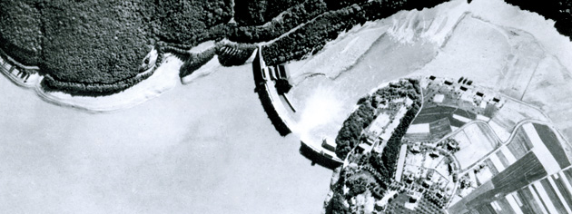 A Royal Air Force vertical reconnaissance photo reveals a massive breach in a dam in May 1943. [PHOTO: IMPERIAL WAR MUSEUM—CH 9750]