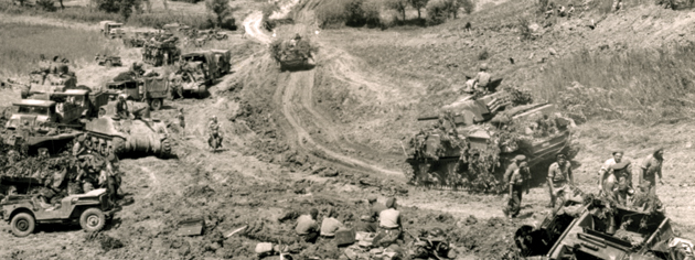 Canadian forces advance between the Gustav and Hitler lines in Italy’s Liri Valley in May 1944. [PHOTO: STRATHY E.E. SMITH, LIBRARY AND ARCHIVES CANADA—PA140208]