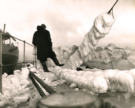 The ice-encrusted deck of HMCS Wetaskiwin in 1942. [PHOTO: J.D. MAHONEY,LIBRARY AND ARCHIVES CANADA–PA116836]