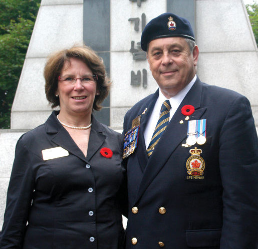 Veterans Affairs Deputy Minister Suzanne Tining joins Legion representative Michael Cook at Naechon. [PHOTO: TOM MACGREGOR]
