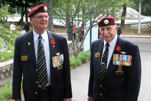 Royal Canadian Regiment veterans Jim Gunn (left) and  Russ Cormier reminisce. [PHOTO: TOM MACGREGOR]