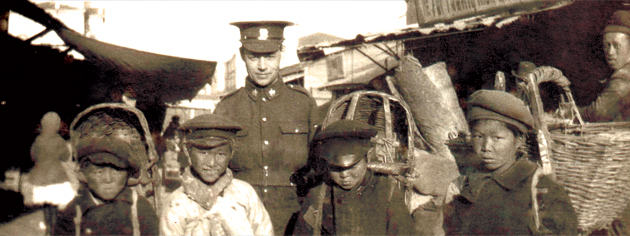 Private Edwin Stephenson poses with some boys at Vladivostok in 1919. [PHOTO: STEPHENSON FAMILY COLLECTION]