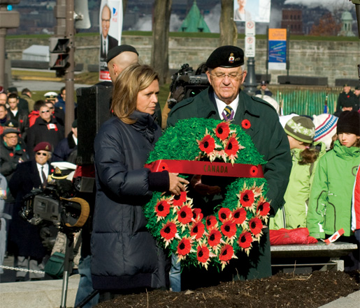 Verner places a wreath assisted by Georges Lasnier. [PHOTO: TOM MacGREGOR]