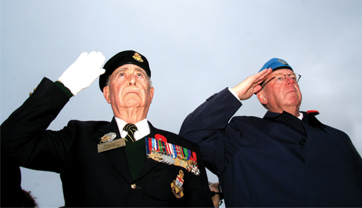 Harry Quarton (left) and Ron Griffis salute. [PHOTO: SHARON ADAMS]