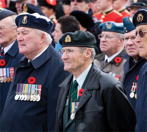 Veterans stand proudly  during the ceremony. [PHOTO: METROPOLIS STUDIO]