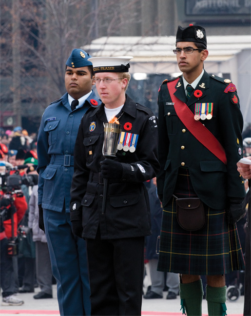 Petty Officer First Class Brian Rainbow (front),  Flight Sergeant Paras Satija (left) and Master Warrant Officer Shawn Claire. [PHOTO: METROPOLIS STUDIO]