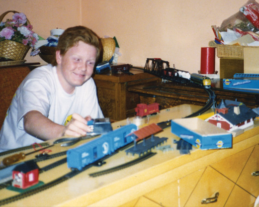 Younger days spent with his train set. [PHOTO: COURTESY NICOLE DOYLE]