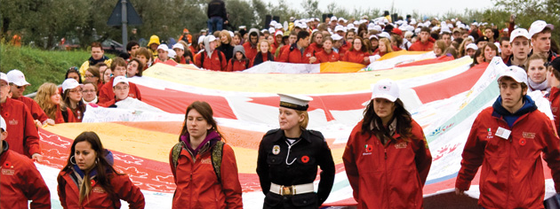 More than 1,200 students march from the Moro River Canadian War Cemetery to Ortona with their Hands Across The Generations Flag. [PHOTO: DAN BLACK]