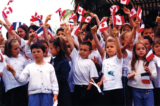 French schoolchildren show appreciation for Canadian Normandy veterans in 2004. [PHOTO: MAC JOHNSTON]