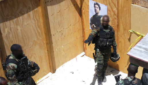A Jamaican senior NCO conducts training in the kill house. [PHOTO: ADAM DAY]
