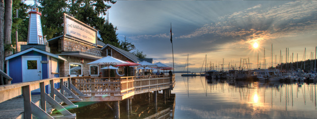 The sun sets on Lund marina and boardwalk. [PHOTO: SUNSHINE COAST TOURISM]