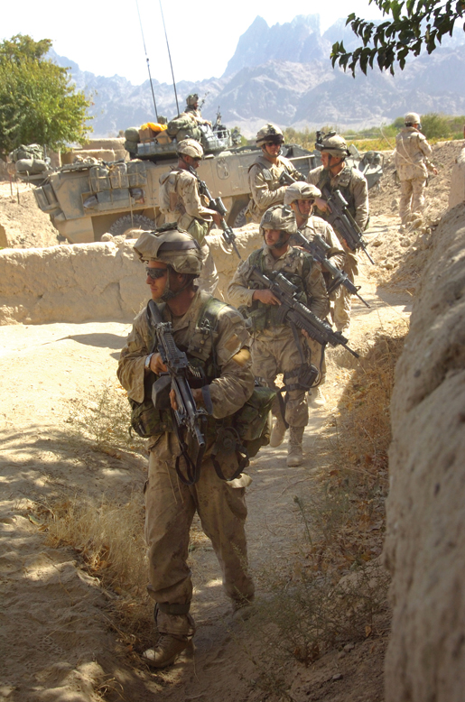 Soldiers from Charles Company conduct operations in the Panjwai district. [PHOTO: SERGEANT LOU PENNEY, CANADIAN FORCES]