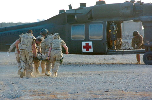 An injured soldier is evacuated. [PHOTO: SERGEANT LOU PENNEY, CANADIAN FORCES]