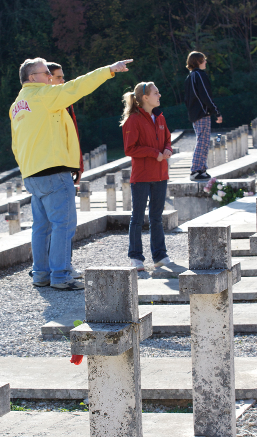 Teacher Dave Robinson and students visit the Polish military cemetery at Monte Cassino, Italy, in 2008. [PHOTO: DAN BLACK]