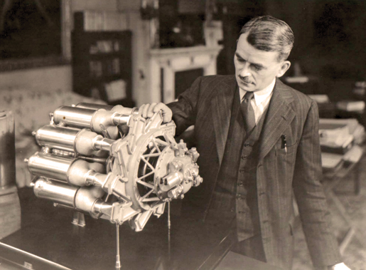 Frank Whittle examines a quarter-scale model of a turbo-jet engine. [PHOTO: ROY FOWKES]