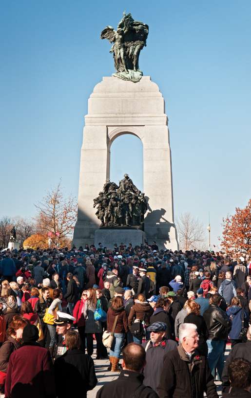 A record-breaking crowd moves in for a closer look at the National War Memorial following the Nov. 11th service. [PHOTO: METROPOLIS STUDIO]