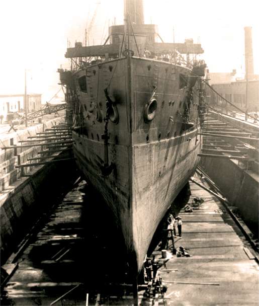 The aged cruiser Niobe sits in dry dock at Halifax. She was commissioned in the Canadian navy on Sept. 16, 1910. [PHOTO: NOTMAN STUDIO, LIBRARY AND ARCHIVES CANADA—PA028497]