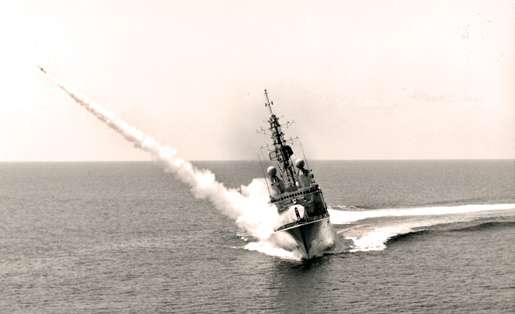 HMCS Iroquois fires a Sea Sparrow anti-aircraft missile during a high-speed turn off Puerto Rico, 1976. [PHOTO: CANADIAN FORCES]