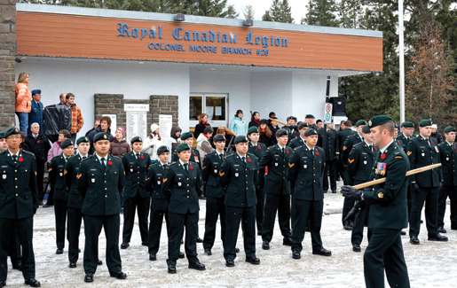 Soldiers of 746 Communications Squadron in front of the Legion’s Col. Moore Branch. [PHOTO: ADAM DAY]