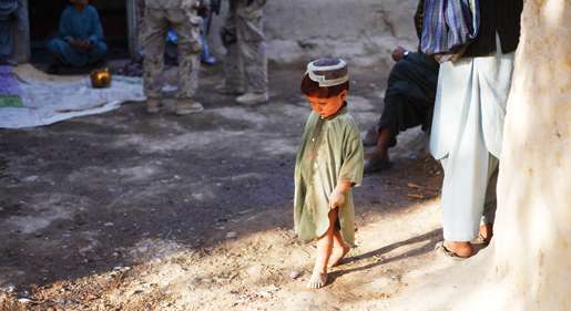 A young villager. [PHOTO: ADAM DAY]