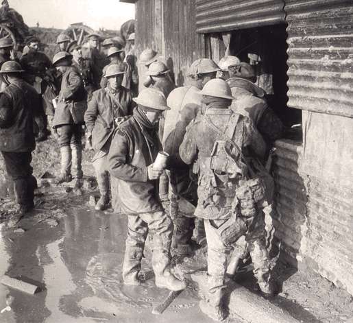 Canadian soldiers line up at a canteen, November 1916. [PHOTO: DND/LIBRARY AND ARCHIVES CANADA—PA000930]
