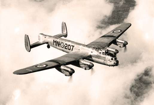 Postwar work for Lancaster MN-207 included aerial surveys. [PHOTO: NATIONAL DEFENCE—PL102456]