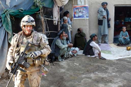 Sergeant Dwayne MacDougall at the Afghan shop just south of the platoon house. [PHOTO: ADAM DAY]