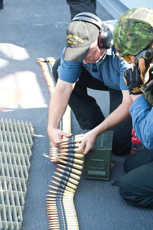 Ammunition is inspected prior to the shoot. [PHOTO: DAN BLACK]