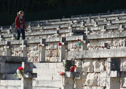 A Canadian student visits the Polish military cemetery on Monte Cassino. [PHOTO: DAN BLACK]