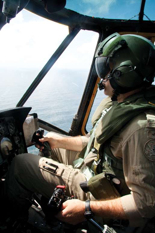 Captain Adam Power pilots the Sea King. [PHOTO: DAN BLACK]