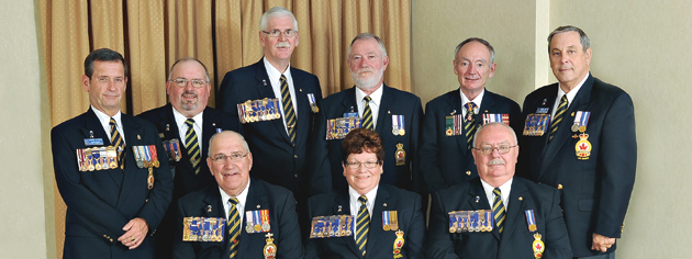 The new Senior Elected Officers of Dominion Command are (front, from left) Past President Wilf Edmond, Dominion President Pat Varga, First Vice Gordon Moore, (rear, from left) Chairman Thomas Irvine, Vice-President Dave Flannigan, Vice-President Tom Eagles, Vice-President George O’Dair, Grand President Larry Murray, Treasurer Mike Cook. [PHOTO: PATRICK RILEY]