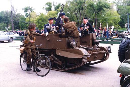 Veterans at the 37th dominion convention in 1998 ride antique military vehicles in the parade. [PHOTO: LEGION MAGAZINE ARCHIVES]