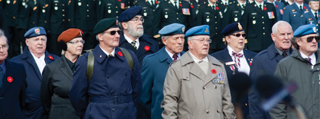 Veterans form up in front of the cenotaph. [PHOTO: TOM MacGREGOR]