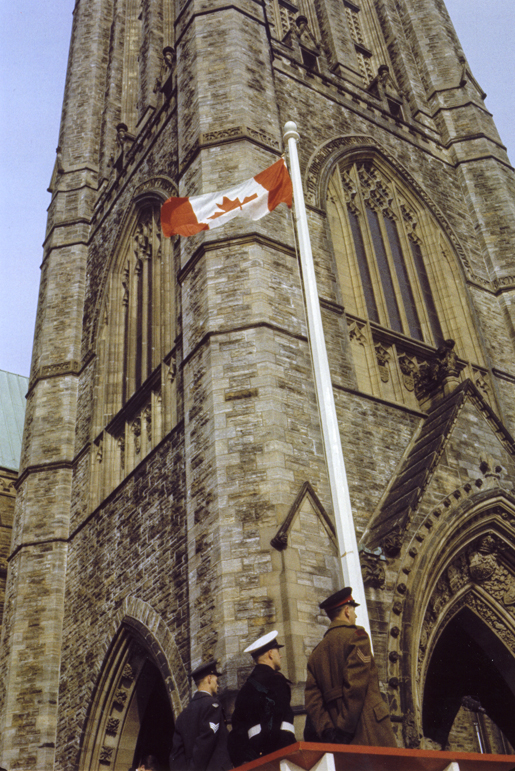First raising of the new Canadian Flag. [PHOTO: LIBRARY AND ARCHIVES CANADA]