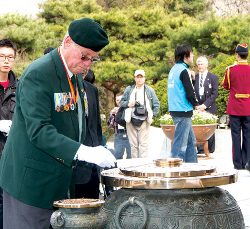 Korea Veterans Association of Canada National President John Bishop participates in the Korean National Cemetery service. [PHOTO: DAN BLACK]