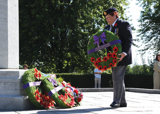 Legion Dominion President Pat Varga places a wreath at the Courcelette Memorial. [PHOTO: SHARON ADAMS]