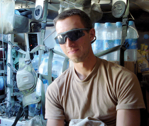 M. Cpl. Owen Kolasky takes a break from loading a LAV III in Afghanistan, 2007. [PHOTO: OWEN KOLASKY]