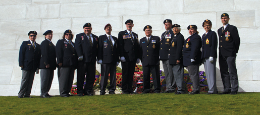 At the Vimy Memorial are (from left) Jacqueline Thompson, Joyce Phillips, Patricia Duffy, Scott Briand, Jean-Pierre Asselin, Dominion Vice-President Tom Eagles, Bill Maxwell, George DeRabbie, Dorothy Butler, Connie Wilson, Sheila Donner and Aaron Bedard. [PHOTO: TOM MacGREGOR]