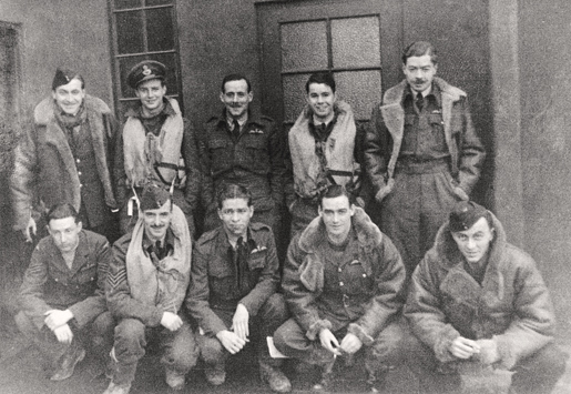 William McRae (standing, fourth from left) shares a moment with other 132 Squadron pilots, late 1941. [PHOTO: McRAE FAMILY COLLECTION]