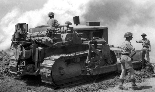Bulldozer of an R.C.E. Field Park Company taking part in the breaking of the Gustav Line by 1st Canadian Corps.