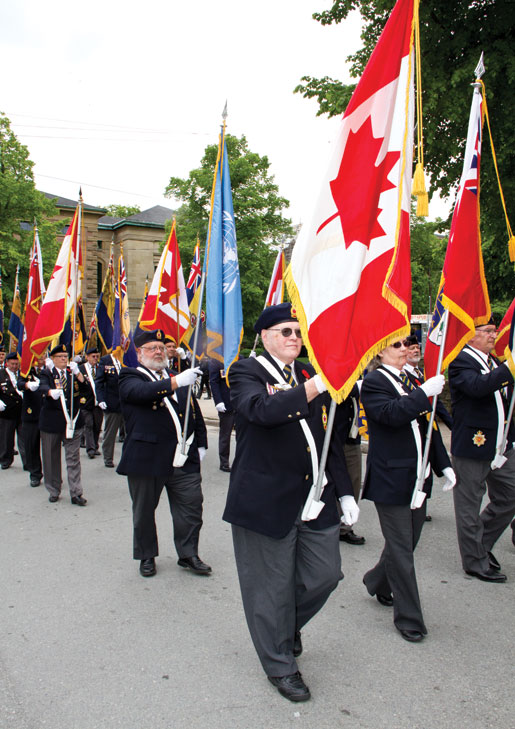 The parade marches through downtown Halifax. [PHOTO: DAN BLACK]