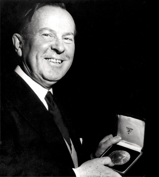 Lester B. Pearson displays his Nobel Peace Prize, December 1956. [PHOTO: ASSOCIATED PRESS]
