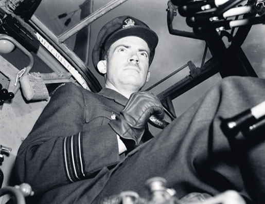 Wing Commander John Fauquier at the controls in 1942. [PHOTO: CANADIAN FORCES JOINT IMAGERY CENTRE—PL10408]