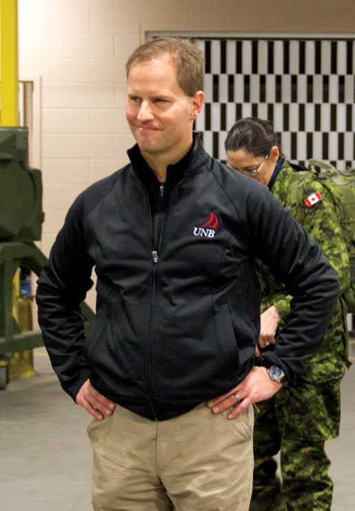Gregg Centre Deputy Director Lee Windsor listens to a military briefing. [PHOTO: TOM MacGREGOR]