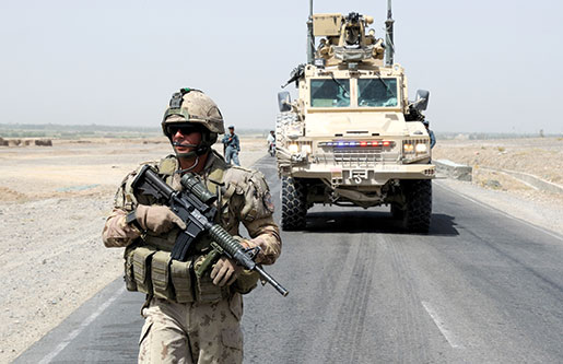 A well-equipped Canadian Forces engineer leads a Nyala armoured vehicle down Route Hyena in the Panjwaii district of Afghanistan. [PHOTO: SGT. MATTHEW MCGREGOR, CANADIAN FORCES COMBAT CAMERA]