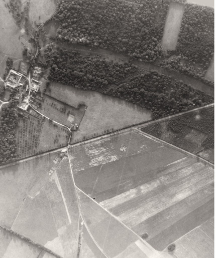 Aerial photo before the bombing at Quesnay Woods. [PHOTO: LAURIER CENTRE FOR MILITARY STRATEGIC AND DISARMAMENT STUDIES AIR PHOTO COLLECTION]