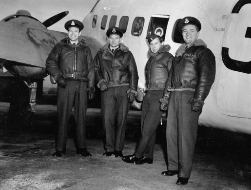 Pilot Officer A.W. Bell, PO D.S. Lave, Flying Officer H.W. Middleton and FO N.F. Wenzel pose next to a Hudson while serving in Iceland with a RAF meteorological squadron. [PHOTO: NATIONAL DEFENCE—PL33820]