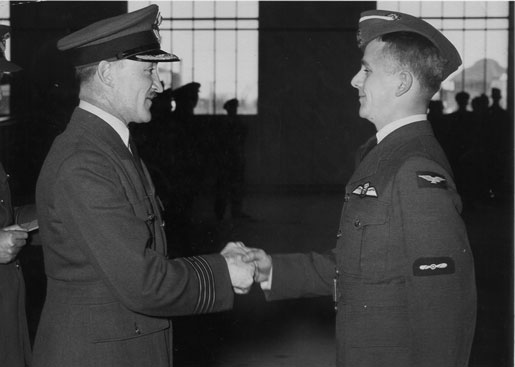 Group Captain F.S. McGill congratulates Cleary after he  received his wings. [PHOTO: COURTESY LYNDA MACPHEE]