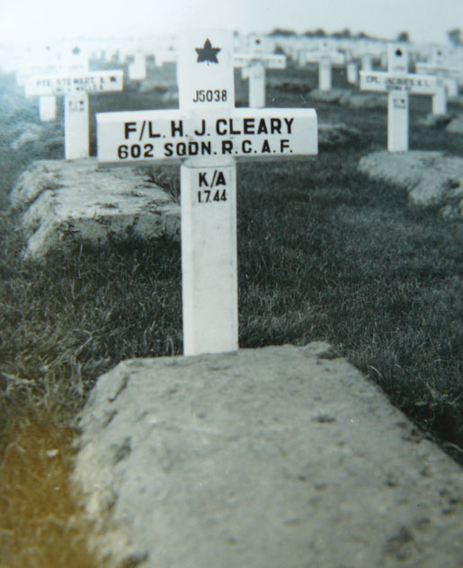 The grave of the young airman. The Commonwealth War Graves Commission later installed a permanent headstone. This temporary marker gives a date of death of July 1, 1944. The date of death was later updated to July 8, 1944. [PHOTO: COURTESY LYNDA MACPHEE]